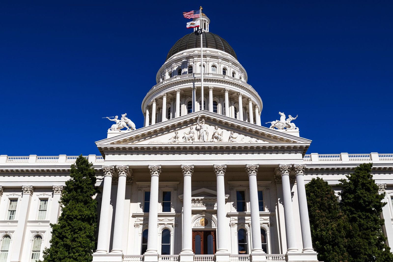 The California State Capitol dome in Sacramento at dusk