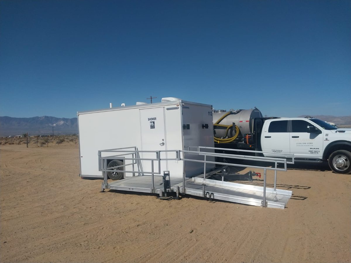All in one accessible combo trailer with ramp leading to the single suite entrance