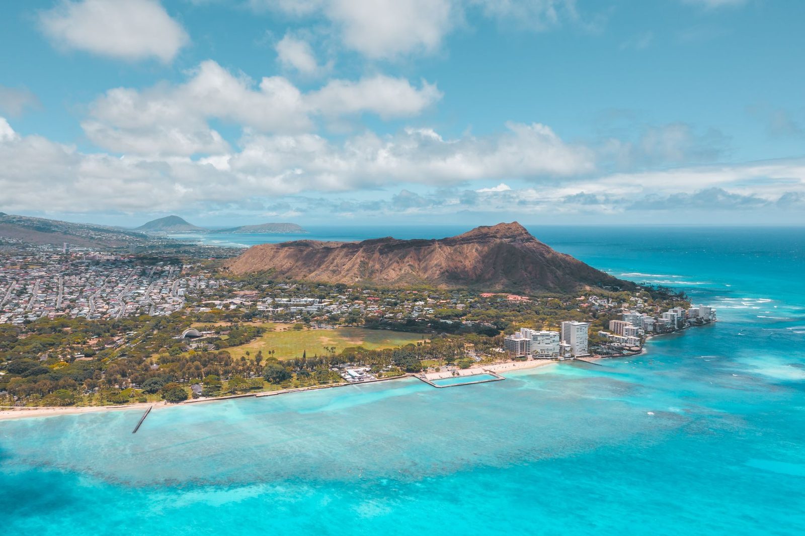 Diamond Head and the neighborhoods of the south shore of Oahu from the air