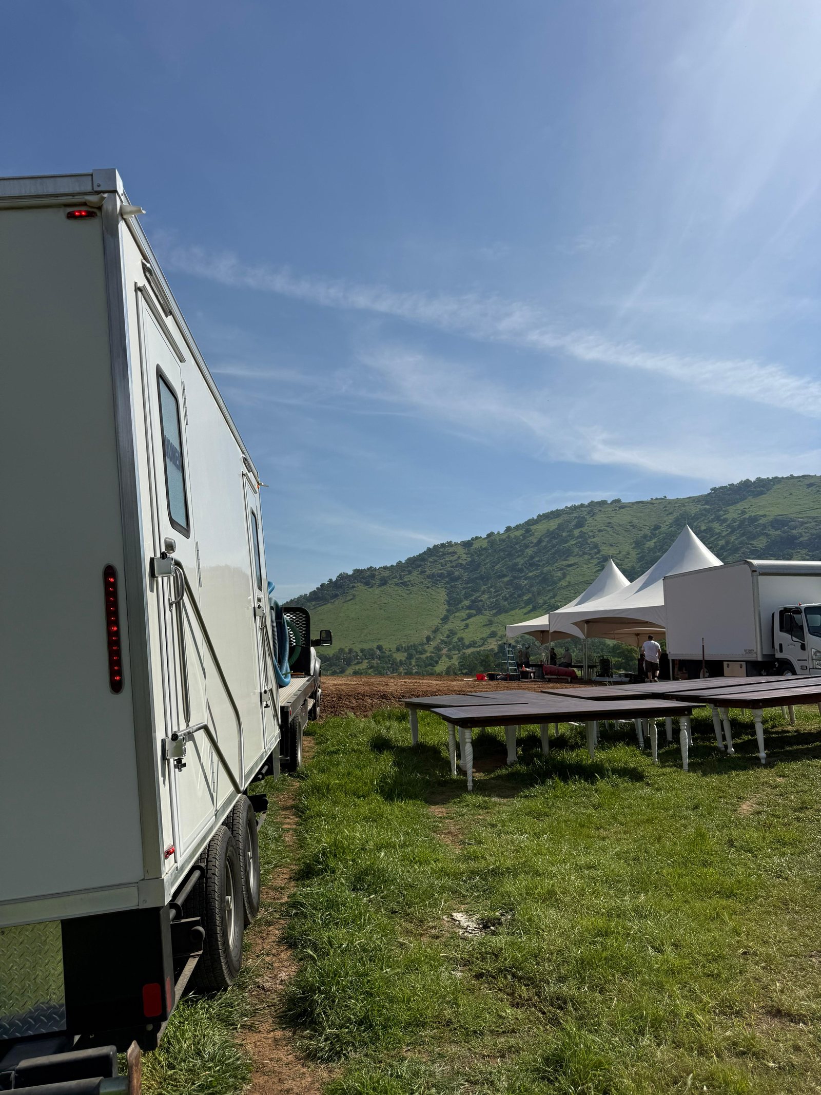 Shower trailer staged at the hillside venue, an Arizona shower trailer rental job